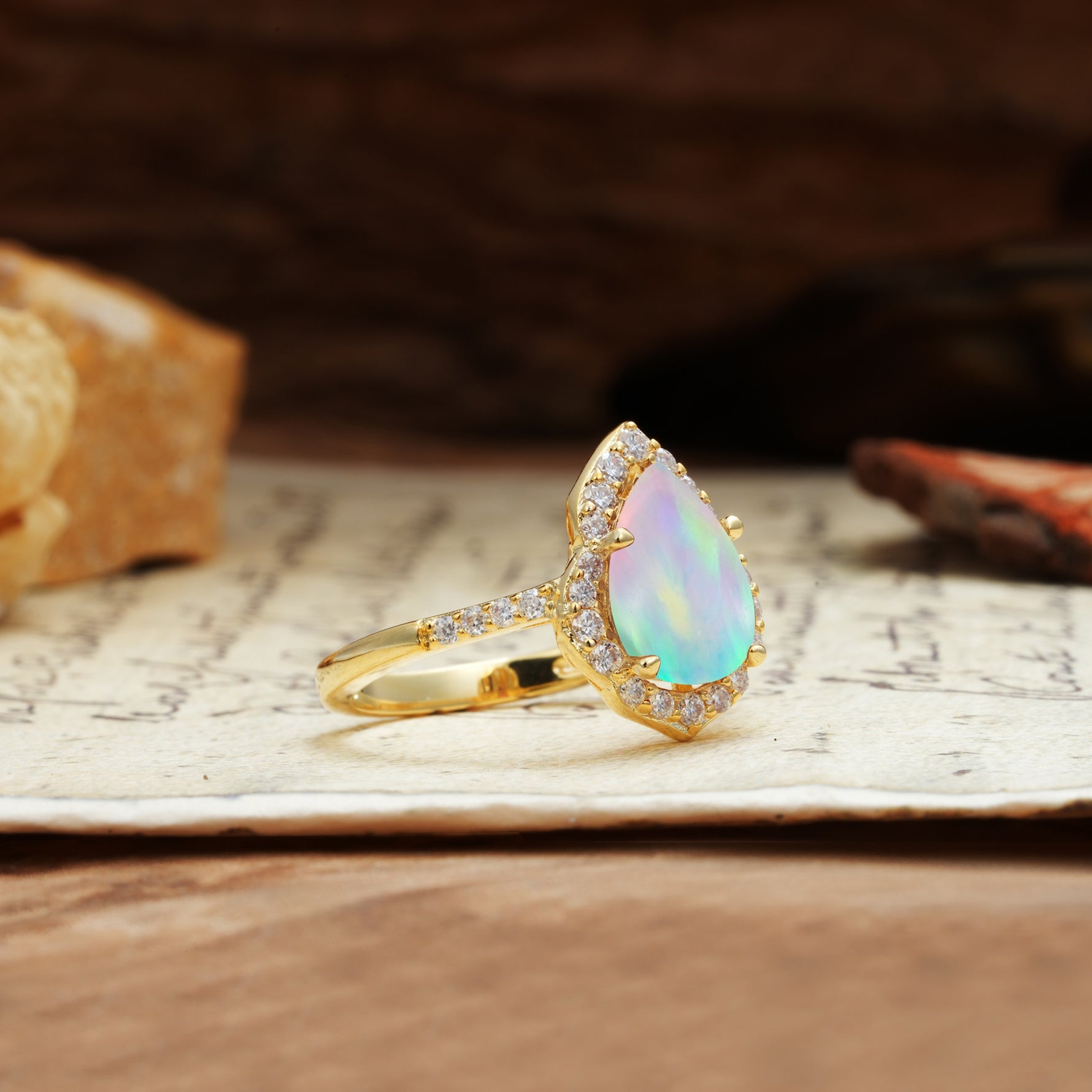 Unique, Luxurious, and Vintage 4-Prong Pear Cut Fire Opal Engagement Ring - Additional view