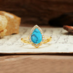 Unique, Luxurious, and Vintage 4-Prong Pear Cut Turquoise Engagement Ring - Additional view