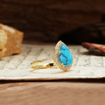 Unique, Luxurious, and Vintage 4-Prong Pear Cut Turquoise Engagement Ring - Additional view