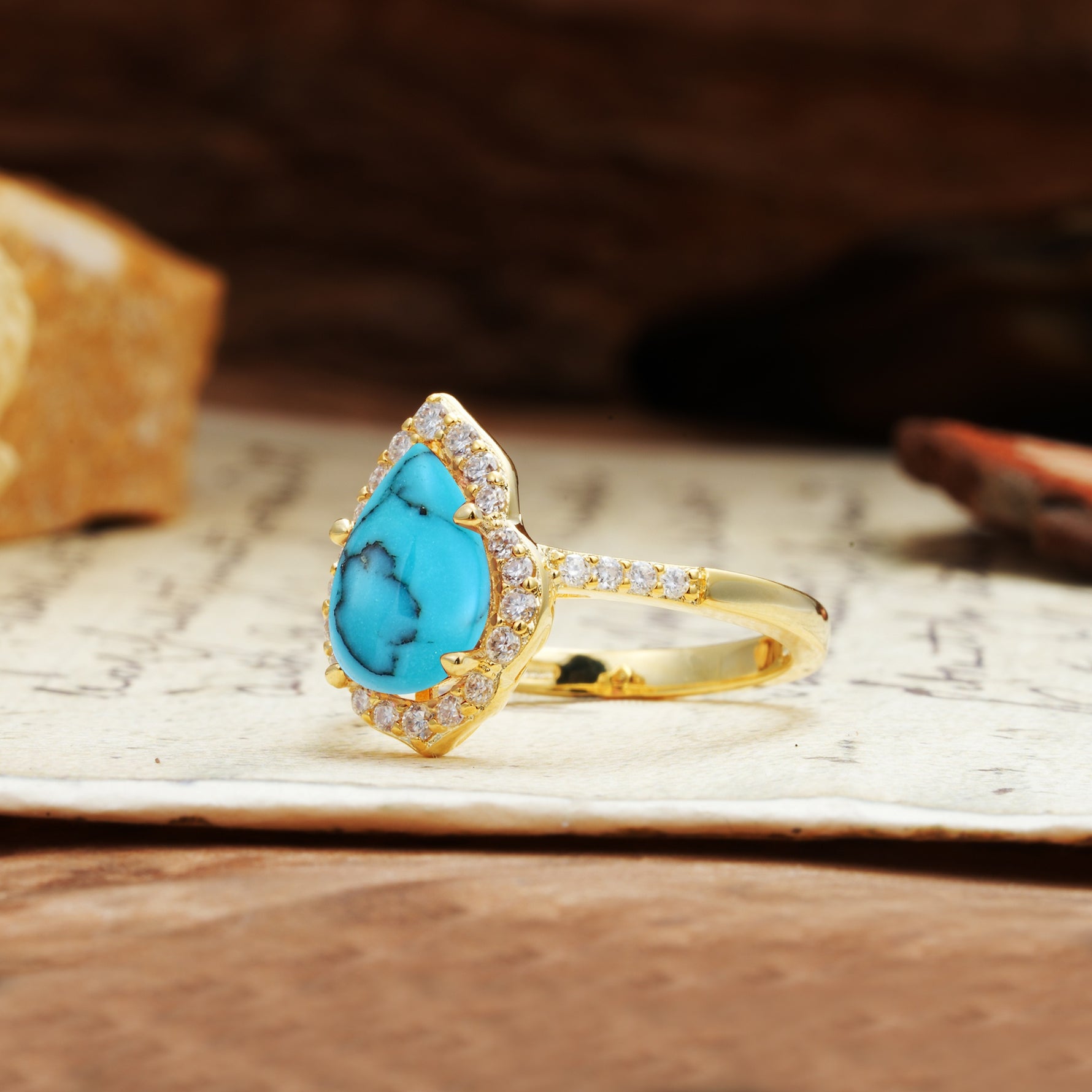 Unique, Luxurious, and Vintage 4-Prong Pear Cut Turquoise Engagement Ring - Additional view