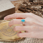 Unique, Luxurious, and Vintage 4-Prong Pear Cut Turquoise Engagement Ring - Additional view