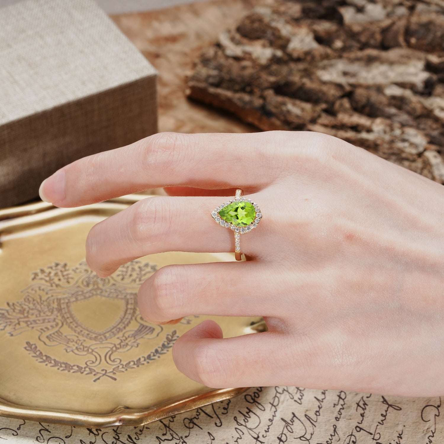 Unique, Luxurious, and Vintage 4-Prong Pear Cut Peridot Engagement Ring - Additional view